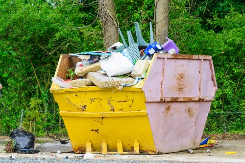 Construction site with organized waste clearance in Palmersgreen